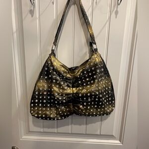 Studded Metallic Black and Gold Shoulder Bag, bow shaped.